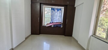 Room in 2 BHK Apartment at Gera World of Joy, Kharadi – for Rent
