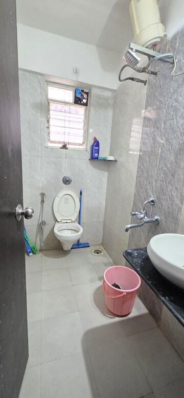 Bathroom in 2 BHK Apartment at Gera World of Joy, Kharadi – for Rent