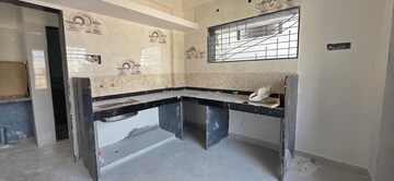 Kitchen in 2 BHK Apartment at Gera World of Joy, Kharadi – for Sale