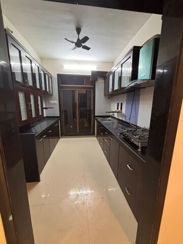 Kitchen in 2 BHK Apartment at Sawan Highness, Kharghar – for Rent