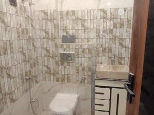 Bathroom in 3 BHK Builder Floor at Mahavir Enclave – for Sale