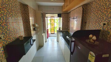 Kitchen in 1 BHK Apartment at Dheeraj Solitaire, Malad West – for Rent