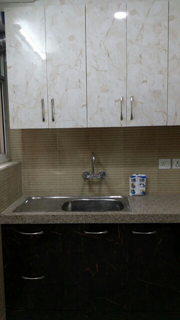 Kitchen in 3.5 BHK Apartment at 3C Lotus Peak, Sector 100 – for Rent