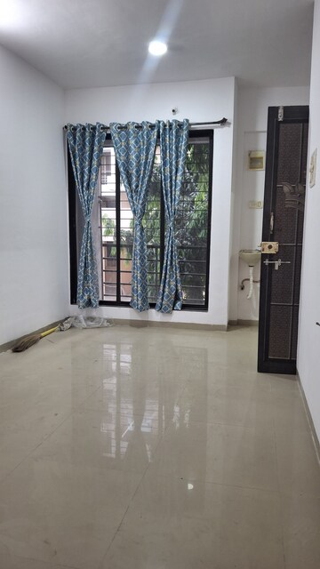 Living Room in 1 BHK Apartment at Malani Orchid, Ulwe – for Sale