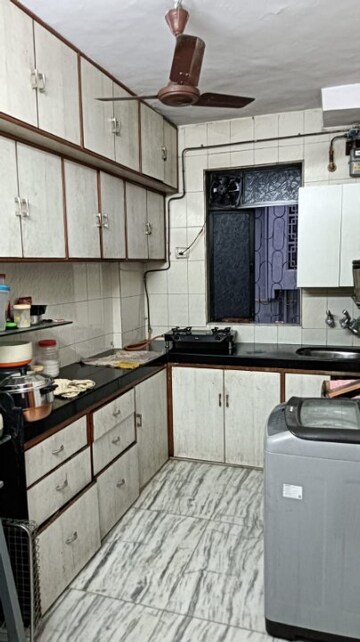 Kitchen in 1 BHK Apartment at Himalaya Parvati CHS, Ghatkopar West – for Sale