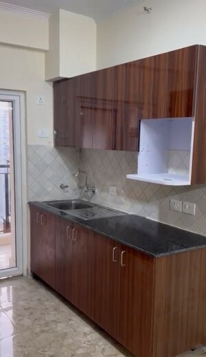 Kitchen in 2 BHK Apartment at Amrapali Centurian Park, Tech Zone 4 Greater Noida – for Rent