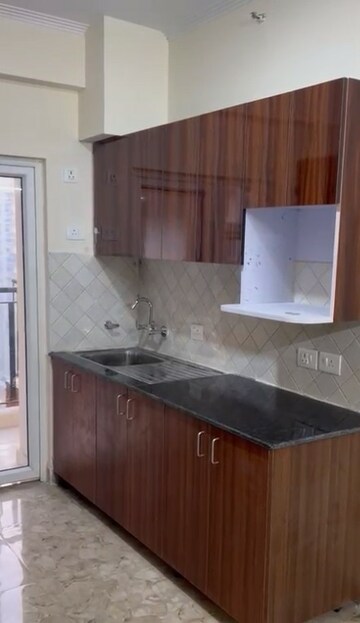 Kitchen in 2 BHK Apartment at Amrapali Centurian Park, Tech Zone 4 Greater Noida – for Rent