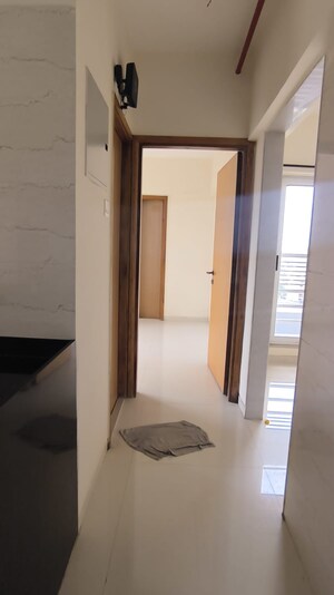 Building Lobby in 1 BHK Apartment at Romell Rhythm, Malad West – for Sale