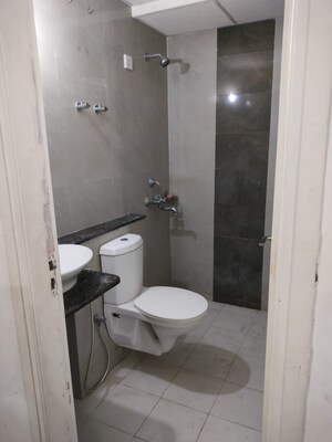 Bathroom in 3 BHK Apartment at Sushma Joynest ZRK, Ghazipur – for Rent