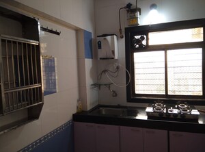 Kitchen in 2 BHK Apartment at Ashok Avenue Marol, Marol – for Rent