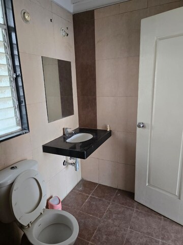 Bathroom in 2 BHK Apartment at Pharande Celestial City, Ravet – for Rent