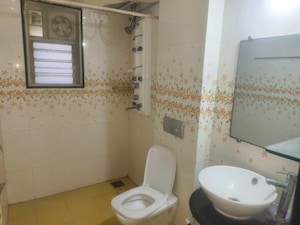 Bathroom in 4 BHK Apartment at Magarpatta City – for Sale