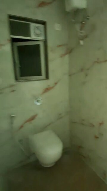 Bathroom in 3 BHK Apartment at Tilak Nagar – for Rent