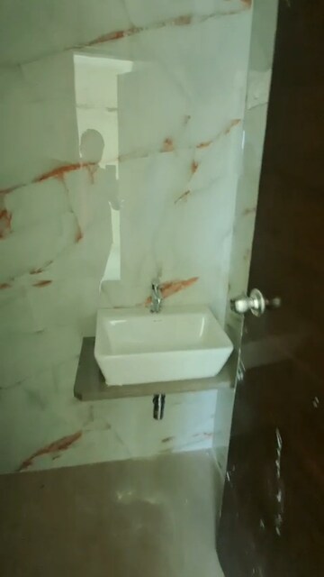 Bathroom in 3 BHK Apartment at Tilak Nagar – for Rent