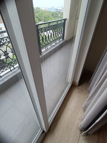 Balcony in 3 BHK Builder Floor at Ansal API Esencia, Sector 67 – for Rent