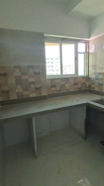 Kitchen in 2.5 BHK Apartment at Tilak Nagar – for Rent