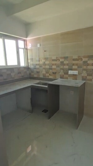 Kitchen in 2.5 BHK Apartment at Tilak Nagar – for Rent