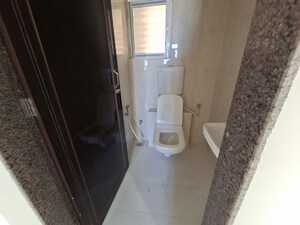 Bathroom in 1 BHK Apartment at Raunak Heights, Ghodbunder Road – for Rent
