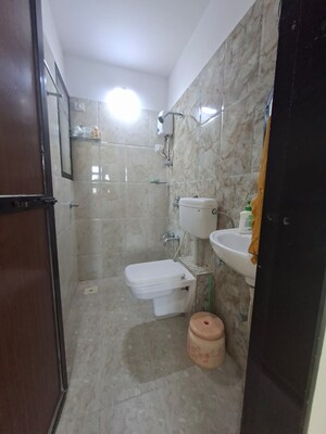 Bathroom in 1 BHK Apartment at Raunak Heights, Ghodbunder Road – for Rent