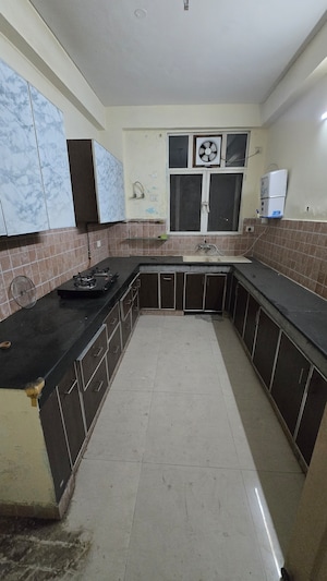 Kitchen in 2 BHK Apartment at Eldeco Green Meadows, Pi Greater Noida – for Rent