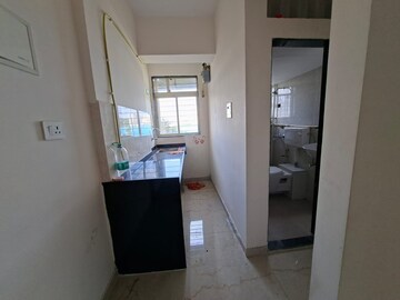 Kitchen in 1 BHK Apartment at Raunak Delight, Owale – for Rent