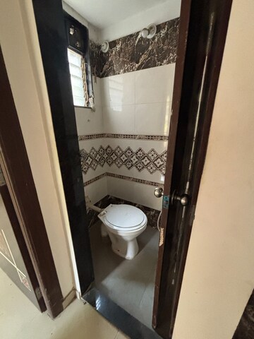 Bathroom in 1 BHK Apartment at Raunak Delight, Owale – for Rent