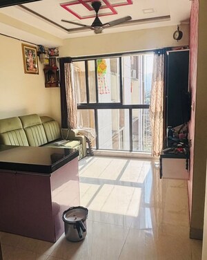 Living Room in 1 BHK Apartment at Lodha Crown Quality Homes, Majiwada – for Rent