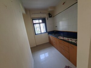 Kitchen in 1 BHK Apartment at Puraniks Tokyo Bay, Kasarvadavali – for Rent
