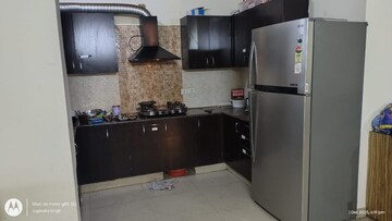 Kitchen in 3.5 BHK Apartment at Aims Golf City, Sector 75 – for Rent