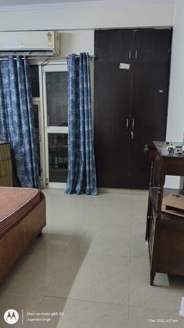 Living Room in 3.5 BHK Apartment at Aims Golf City, Sector 75 – for Rent