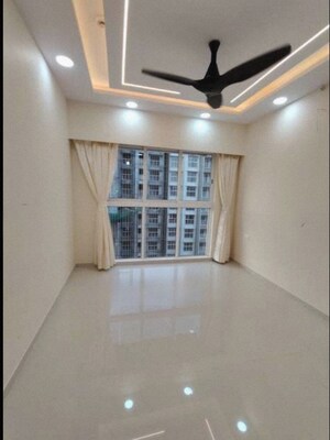 Living Room in 2 BHK Apartment at Lodha Amara Tower 23, Kolshet Road – for Rent