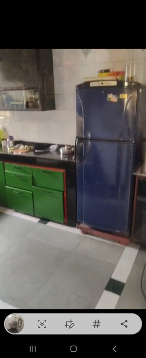 Kitchen in 1 BHK Apartment at Gauri Shankar CHS, Dombivli West – for Sale