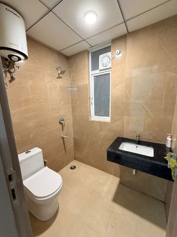 Bathroom in 3.5 BHK Apartment at M3M Soulitude, Sector 89 – for Rent