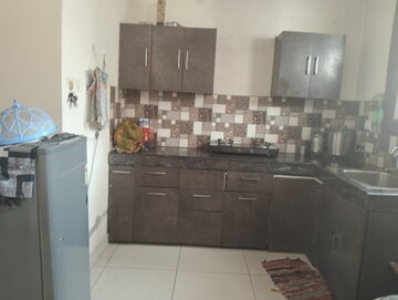 Kitchen in 2 BHK Builder Floor at Guru Nanak Enclave, Dhakoli – for Rent
