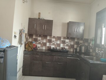 Kitchen in 2 BHK Builder Floor at Guru Nanak Enclave, Dhakoli – for Rent