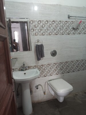Bathroom in 2 BHK Builder Floor at Guru Nanak Enclave, Dhakoli – for Rent