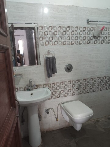 Bathroom in 2 BHK Builder Floor at Guru Nanak Enclave, Dhakoli – for Rent