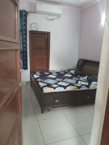 Bedroom in 2 BHK Builder Floor at Guru Nanak Enclave, Dhakoli – for Rent