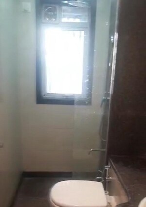 Bathroom in 2 BHK Apartment at Group Seven Rushi Heights, Goregaon East – for Rent