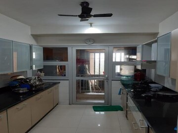 Kitchen in 4 BHK Apartment at DB Realty Orchid Woods, Goregaon East – for Rent