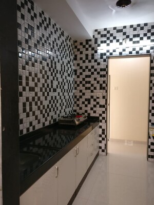 Team Area in 1 BHK Apartment at Royal Crystal Wing B, Malad East – for Rent