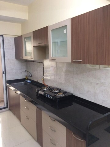 Kitchen in 2 BHK Apartment at Unique The Skyline, Mira Road – for Rent
