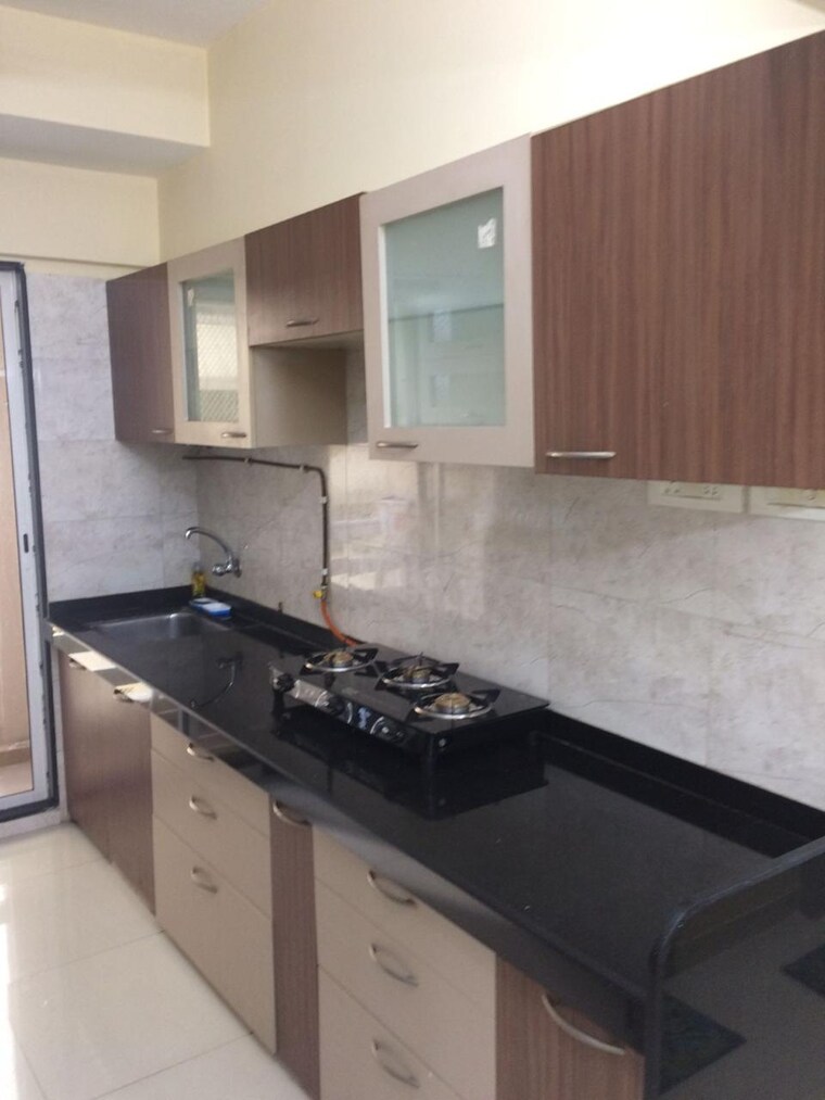 Kitchen, unique-the-skyline 2 Bedroom 925 Sq.Ft. Apartment In Mira Road Thane 9554728