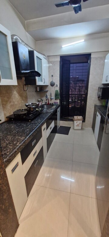 Kitchen in 2 BHK Apartment at Hubtown Gardenia, Mira Road – for Rent
