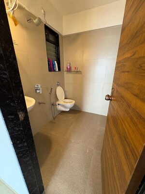 Bathroom in 1 BHK Apartment at Je and Vee Vrindavan, Malad East – for Rent