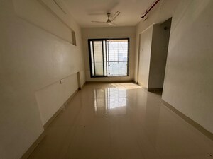 Room in 1.5 BHK Apartment at Haware 16, Malad East – for Rent