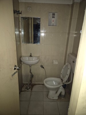 Bathroom in  Office Space at Vibhuti Khand – for Rent