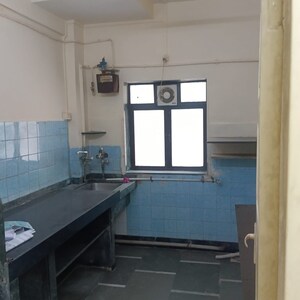 Kitchen in 2 BHK Apartment at Sundar Nagar CHS, Malad West – for Rent