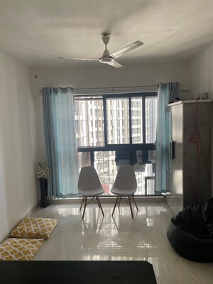 Living Room in 1 BHK Apartment at Lodha Crown Quality Homes, Majiwada – for Rent