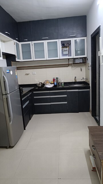 Kitchen in 2 BHK Apartment at Aishwaryam Greens Co-operative Housing Society, Wakad – for Sale